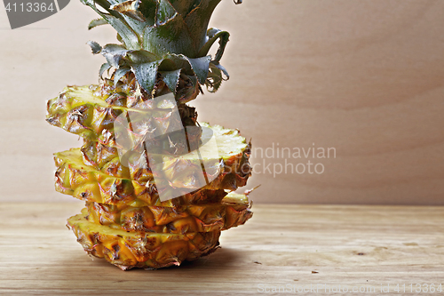 Image of Sliced pineapple on cutting board