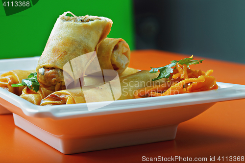 Image of Spring rolls on a cafe table