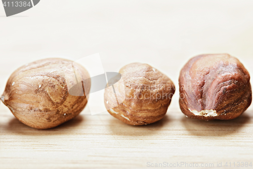 Image of Three hazelnuts