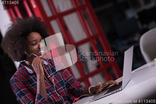 Image of portrait of a young successful African-American woman in modern 