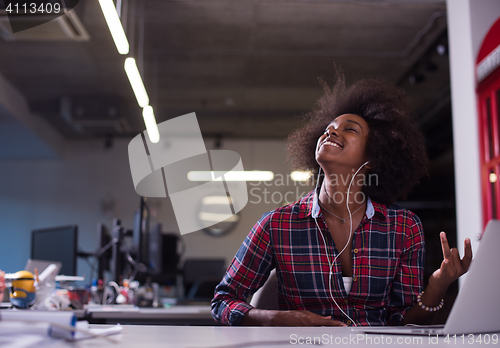 Image of portrait of a young successful African-American woman in modern 