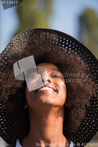 Image of Close up portrait of a beautiful young african american woman sm