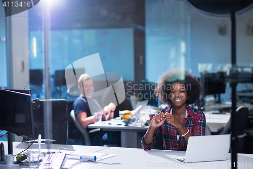 Image of portrait of a young successful African-American woman in modern 