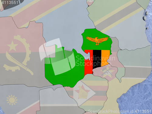 Image of Zambia with flag on globe