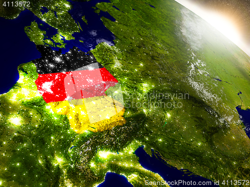 Image of Germany with flag in rising sun