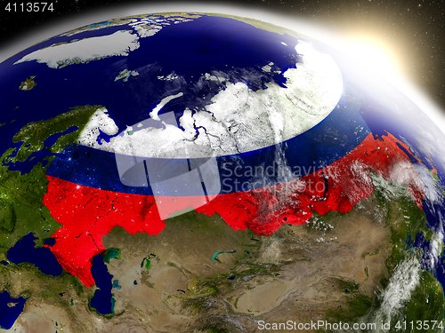 Image of Russia with flag in rising sun