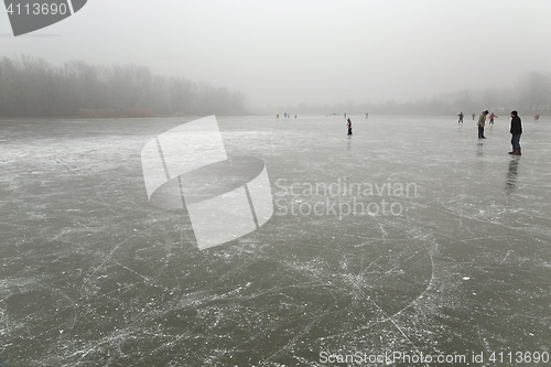 Image of Skating on frozen lake