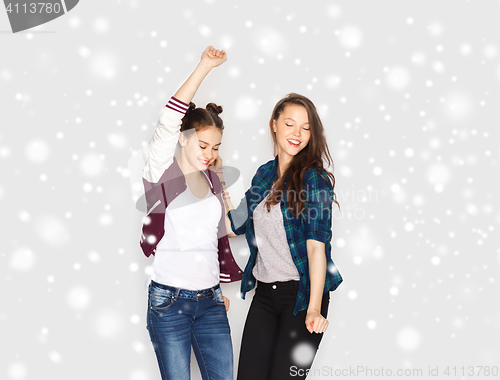 Image of happy smiling pretty teenage girls dancing