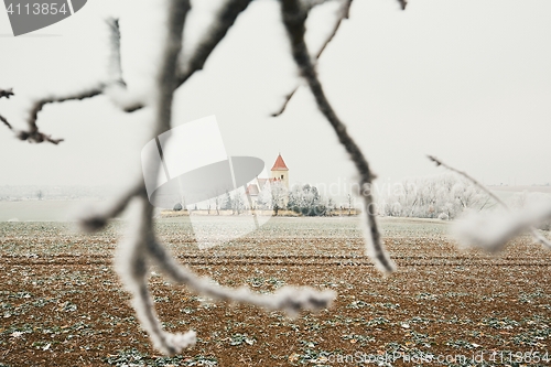 Image of Small cemetery amid frozen landscape