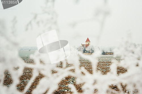 Image of Small cemetery amid frozen landscape