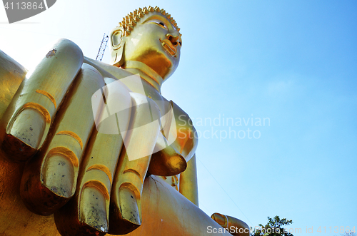 Image of Golden Buddha statue of Big Buddha over blue sky 