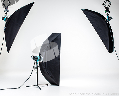 Image of Empty photo studio with lighting equipment