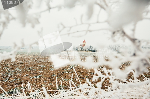 Image of Small cemetery amid frozen landscape