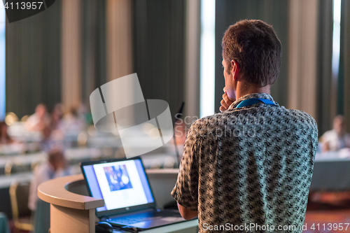 Image of Public speaker giving talk at scientific conference.