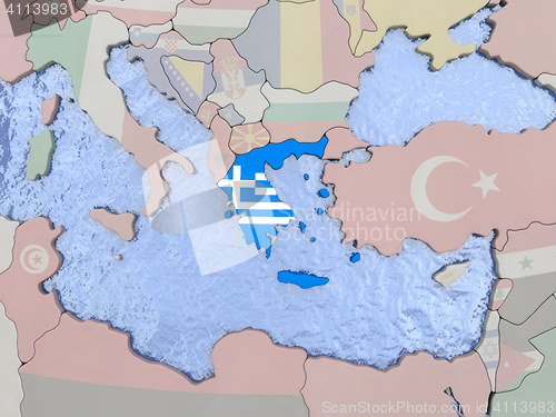 Image of Greece with flag on globe