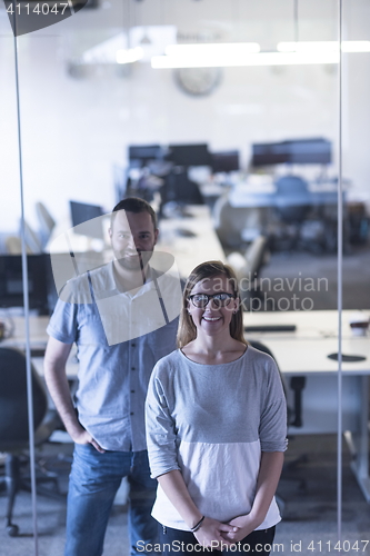 Image of business couple at office