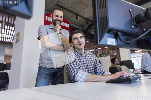 Image of startup business people group working as team to find solution