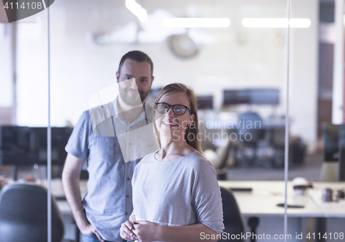Image of business couple at office