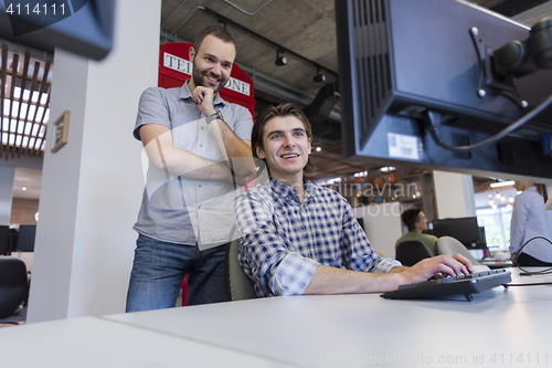 Image of startup business people group working as team to find solution