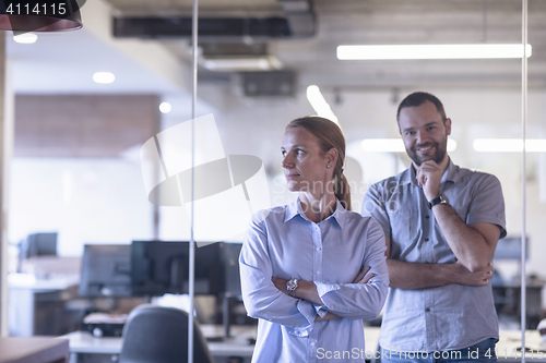 Image of business couple at office