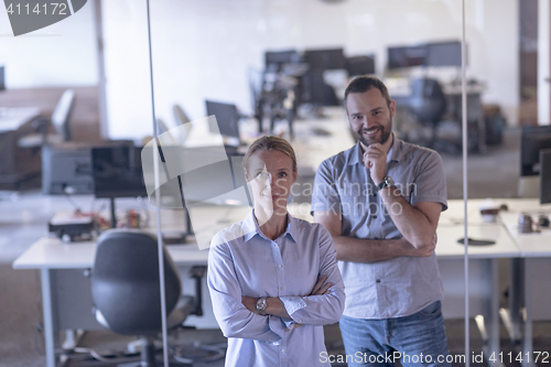 Image of business couple at office