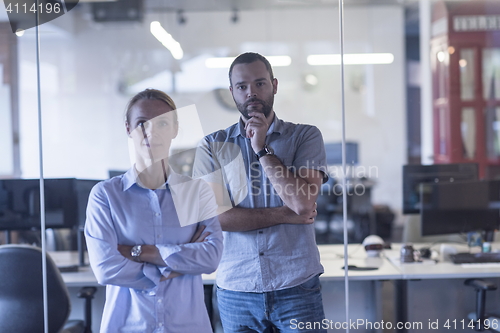 Image of business couple at office