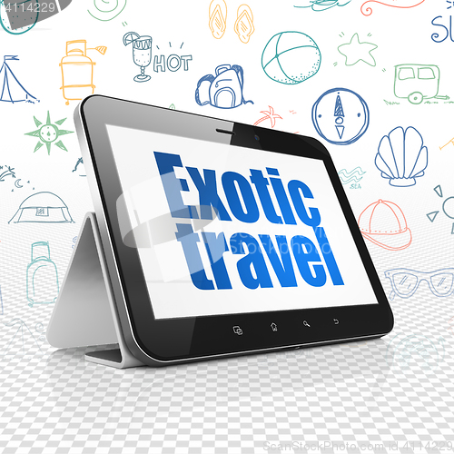 Image of Tourism concept: Tablet Computer with Exotic Travel on display