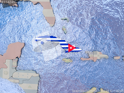 Image of Cuba with flag on globe