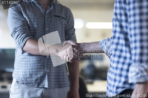 Image of start up business people  handshake