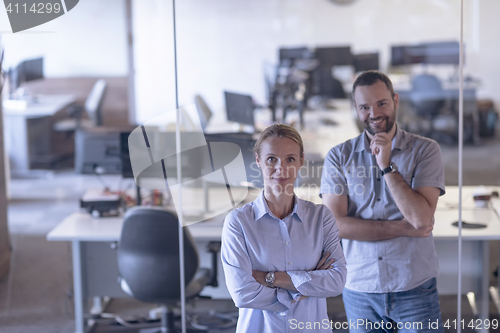 Image of business couple at office