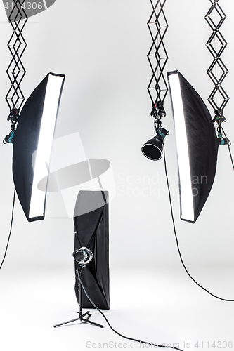 Image of Empty photo studio with lighting equipment