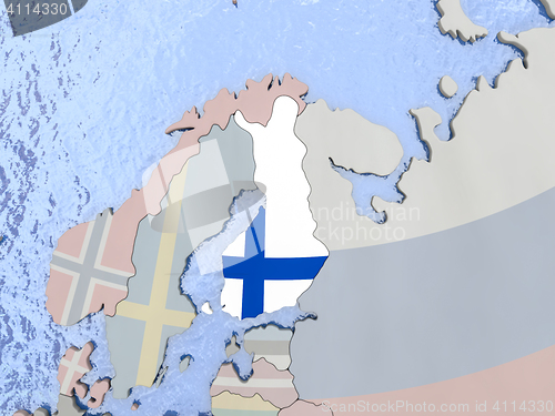 Image of Finland with flag on globe