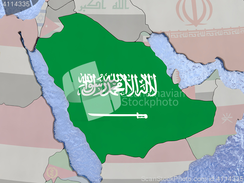 Image of Saudi Arabia with flag on globe
