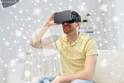 Image of young man in virtual reality headset or 3d glasses