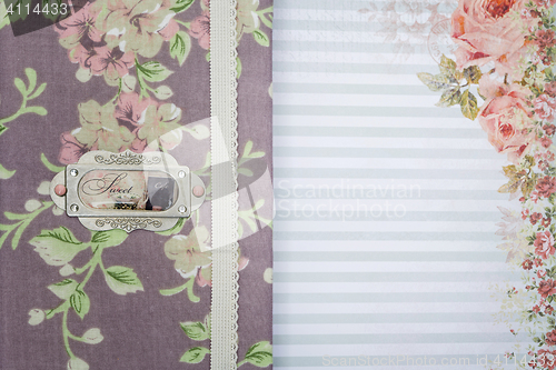 Image of Scrapbooking holder for travel documents on floral paper