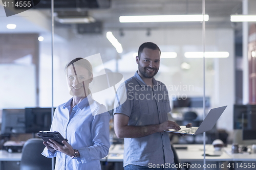 Image of business couple at office