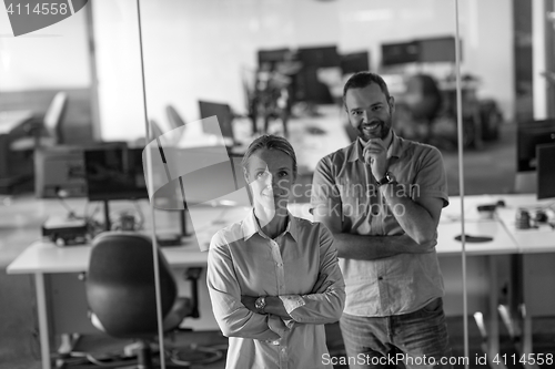 Image of business couple at office