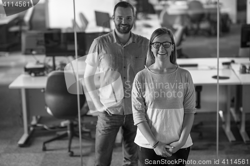 Image of business couple at office