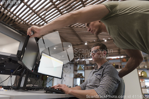 Image of startup business people group working as team to find solution