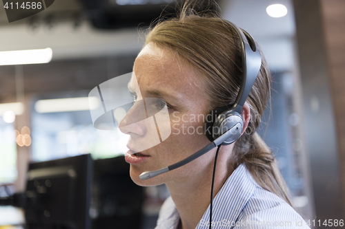 Image of female support phone operator