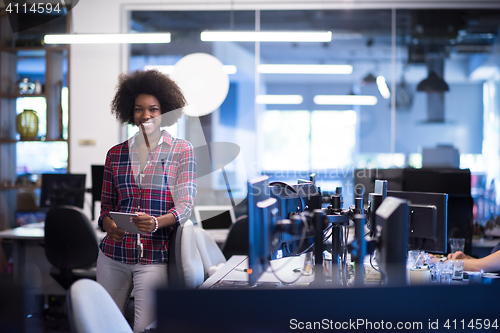 Image of young black woman at her workplace in modern office  African-Ame