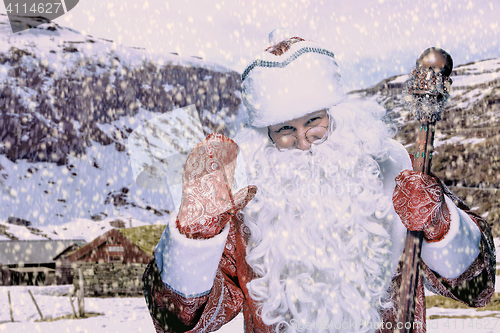 Image of happy Santa Claus looking at camera