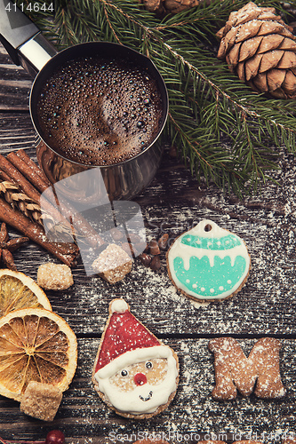 Image of Gingerbreads and coffee for new years or christmas