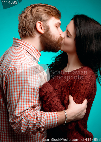 Image of Young man and woman kissing