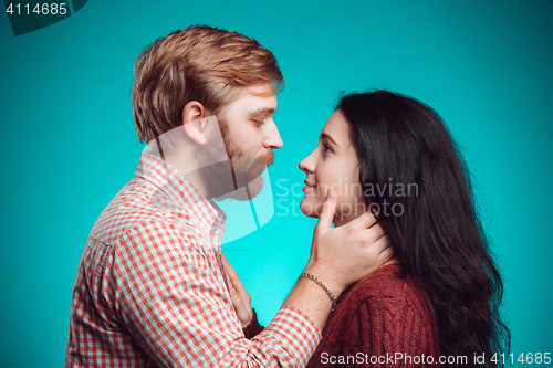 Image of The embrace of young man and woman