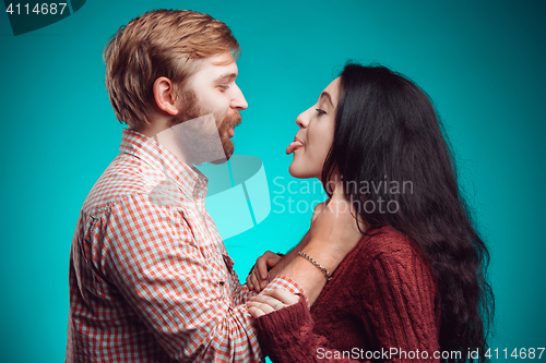 Image of The embrace of young man and woman