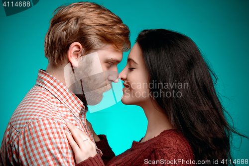 Image of The embrace of young man and woman