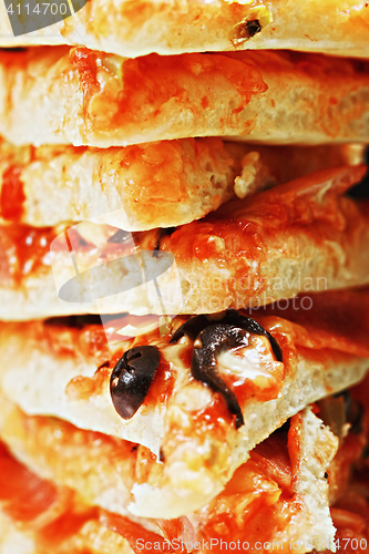 Image of Stack of pizza closeup