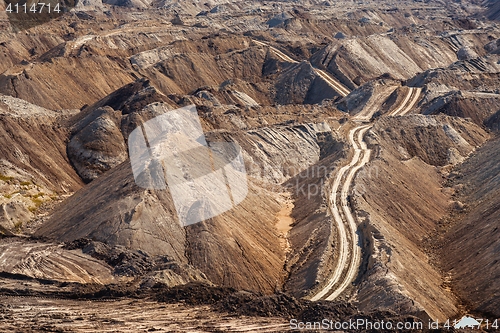 Image of Large excavation site with roads ahead