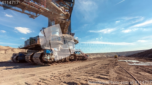 Image of Large excavator machine in the mine